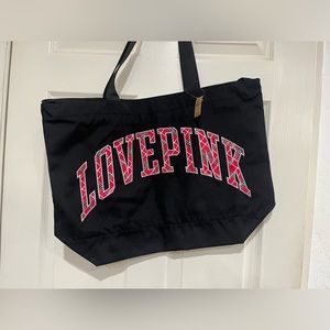 Victoria’s Secret bag, measures 16” x 21”, black, pink, red.  Never used!